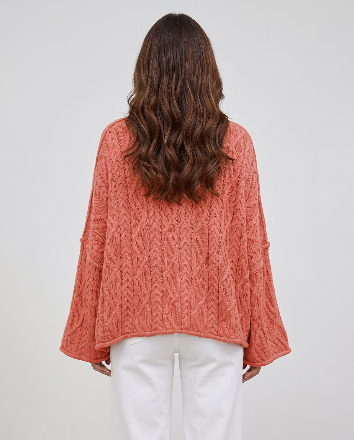 Women's watermelon red oversized cable knit sweater, back view