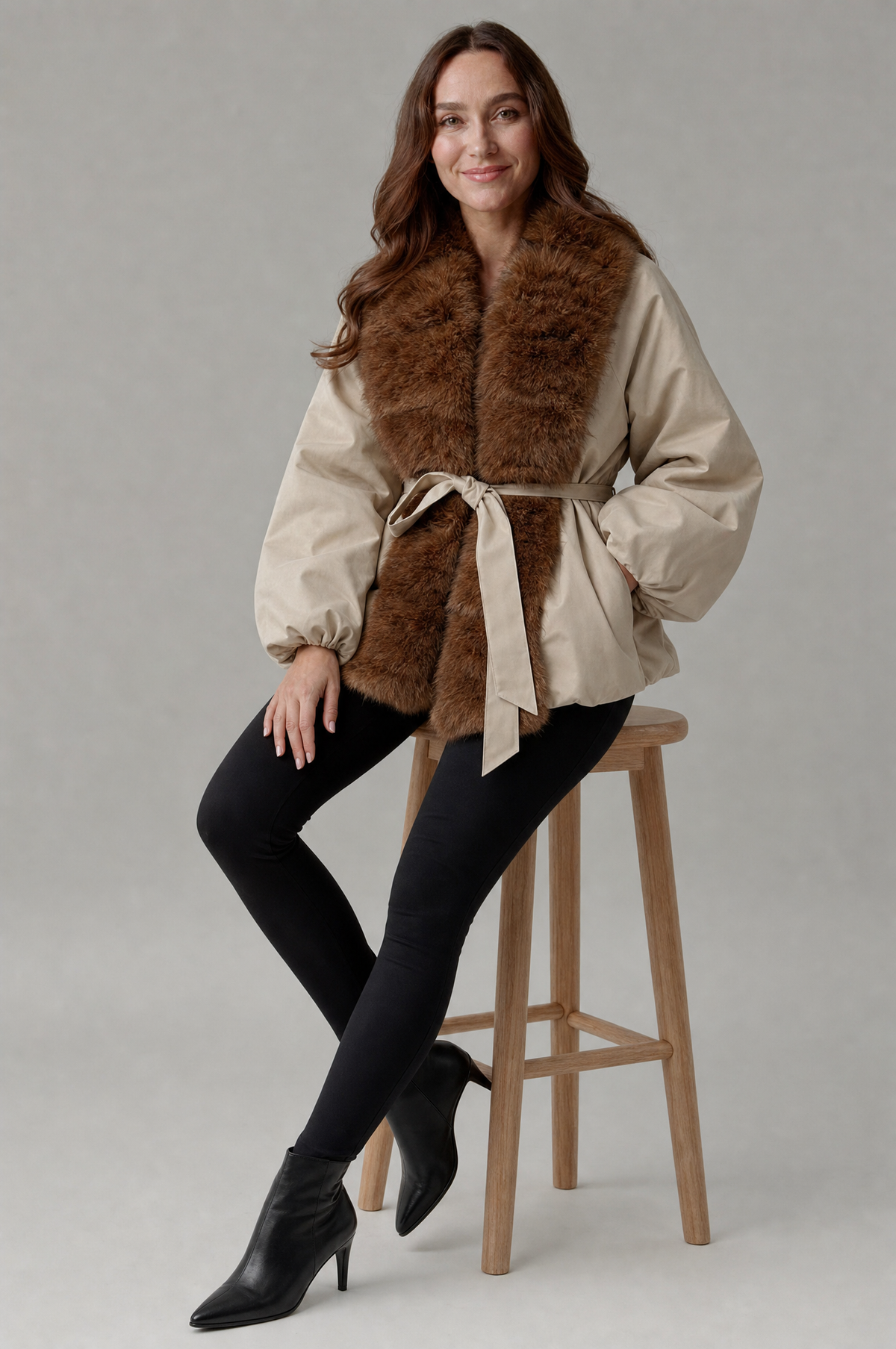 Women's khaki fur collar winter coat – seated