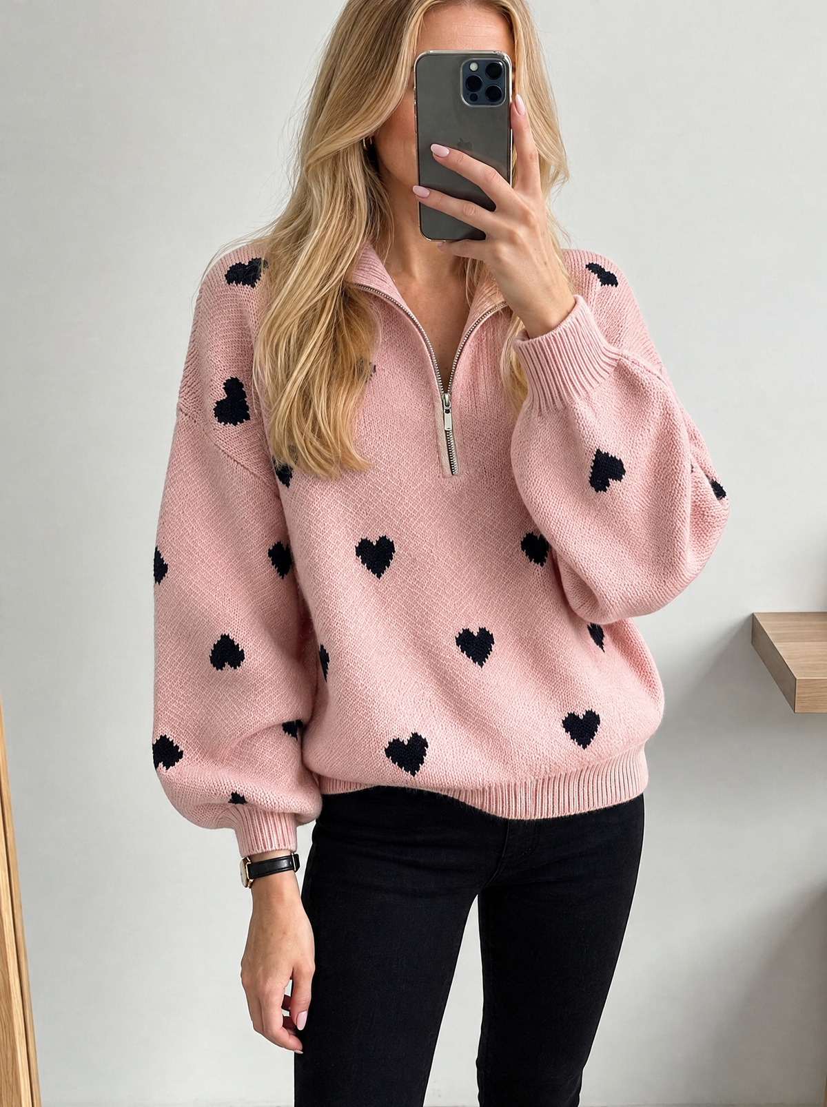 Blonde model in heart jacquard zipper knit sweater