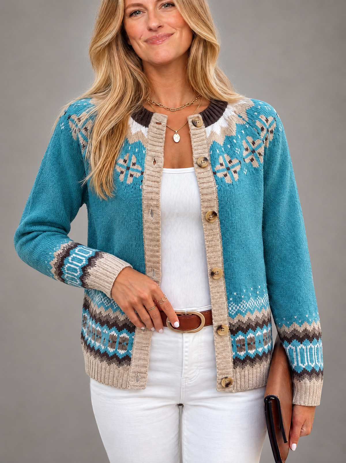 Blonde model in jacquard knit cardigan detail