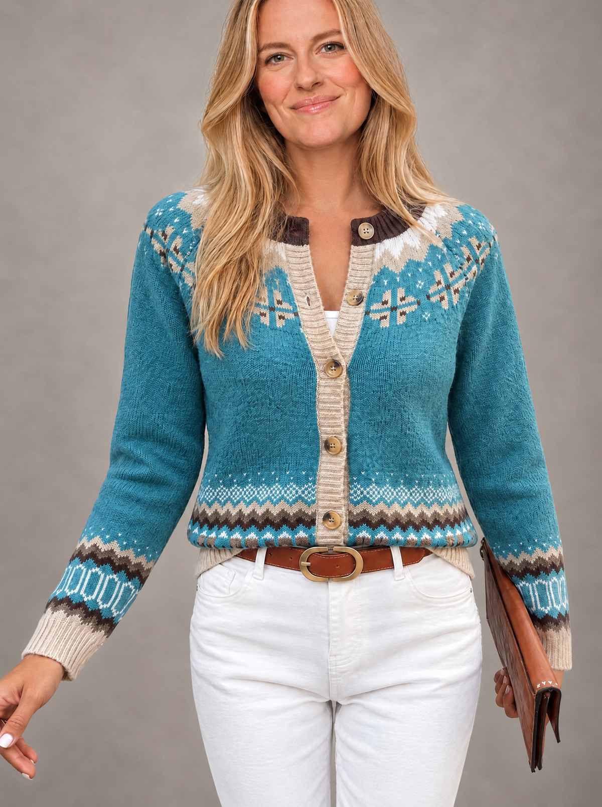 Blonde model wearing Isle cardigan, side view