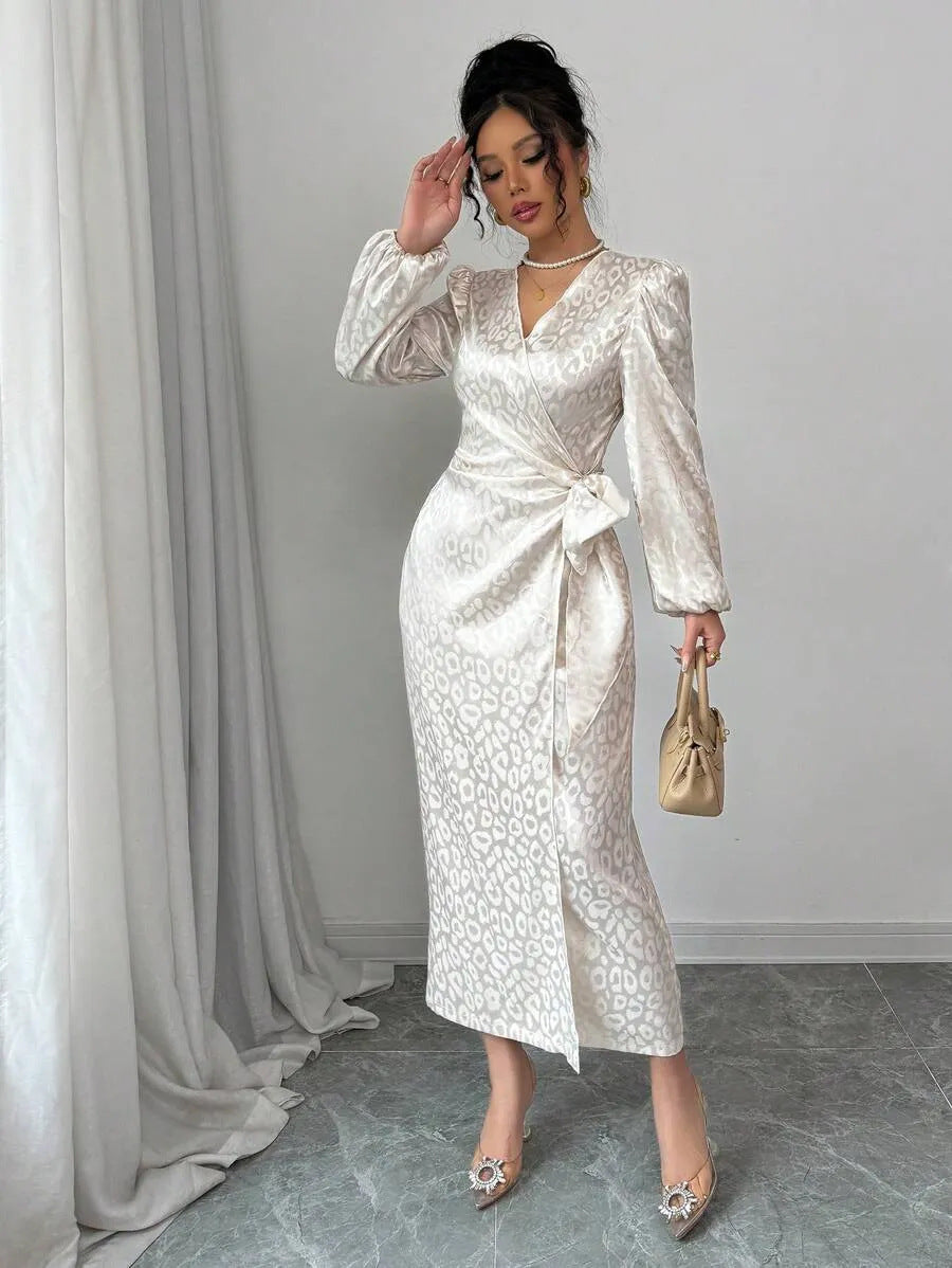 Leopard print satin evening maxi dress showing drape and hem